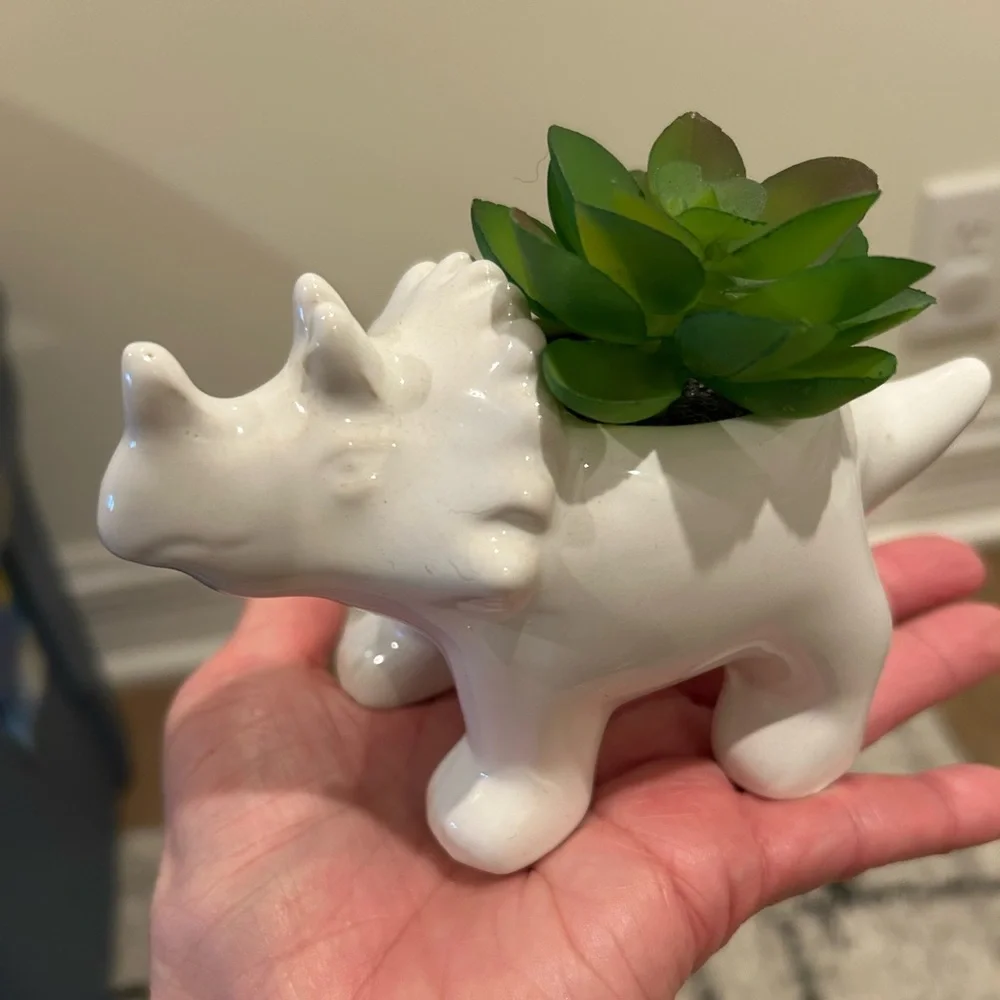 Faux plant with ceramic small rhino